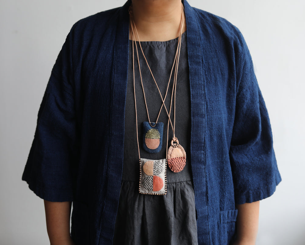 STITCHED NECKLACES