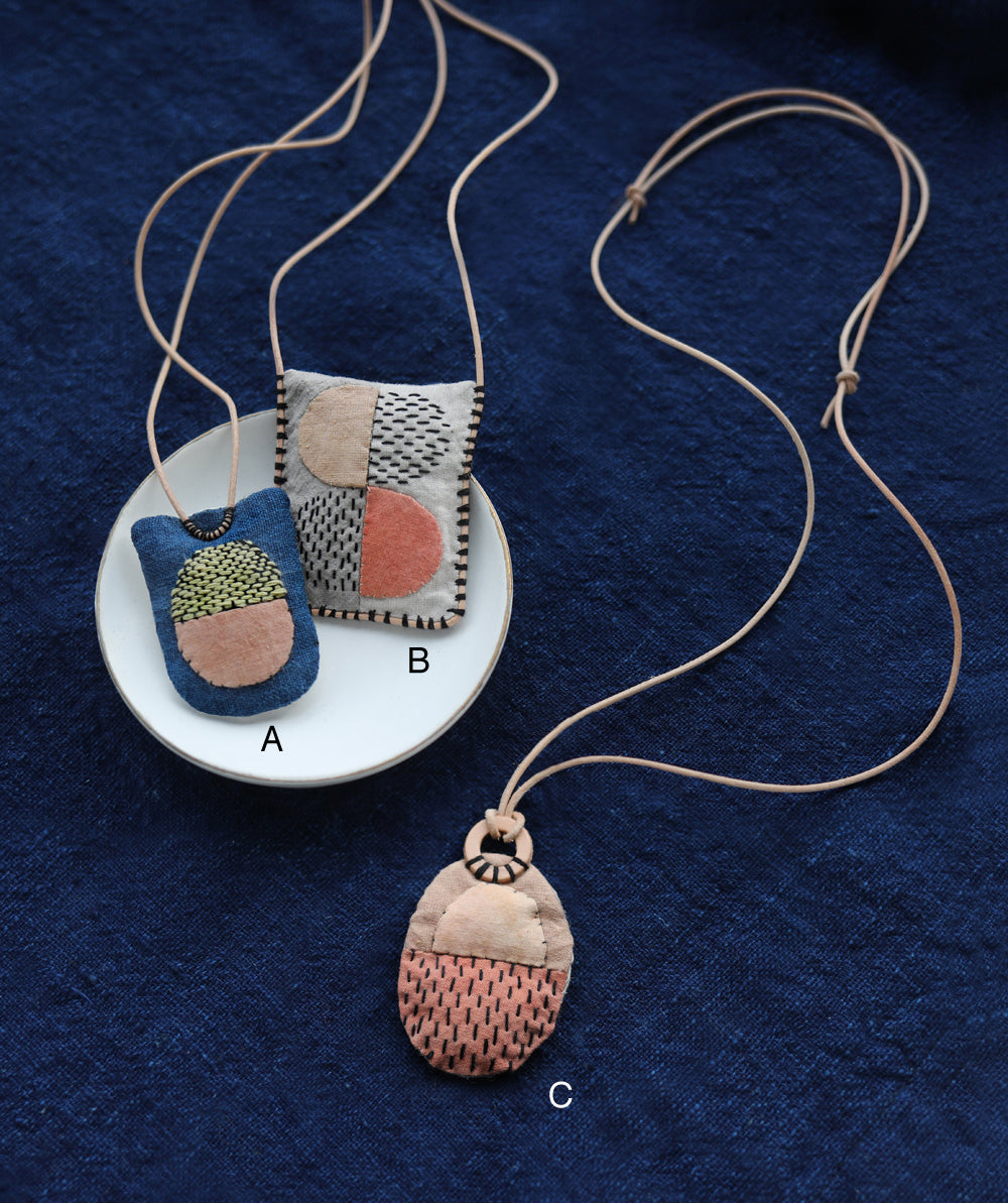 STITCHED NECKLACES